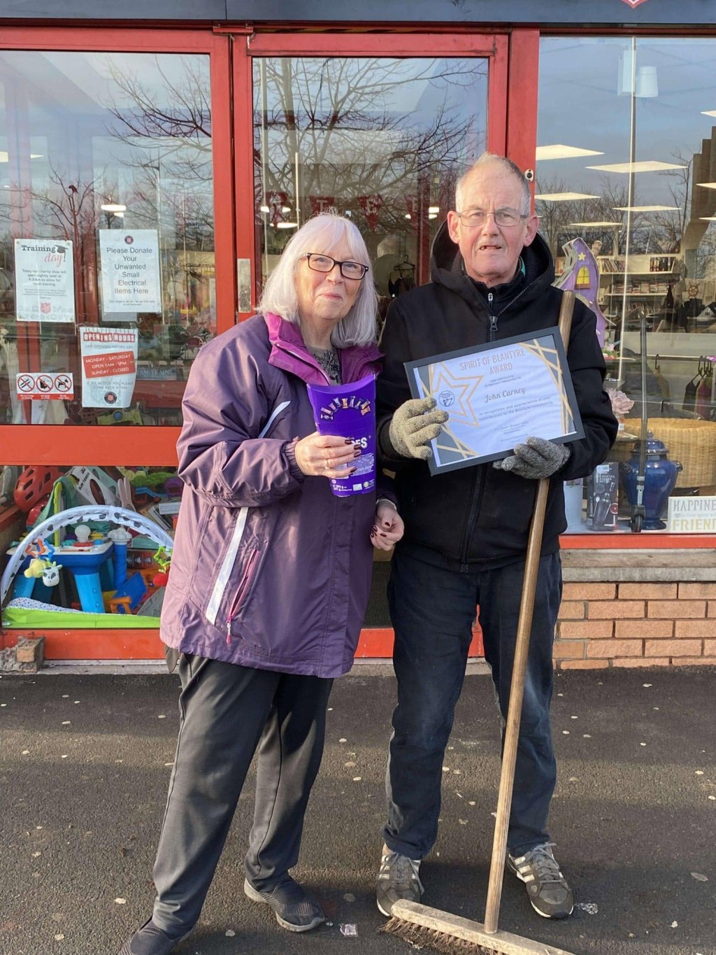 John Carney receiving a Spirit of Blantyre certificate